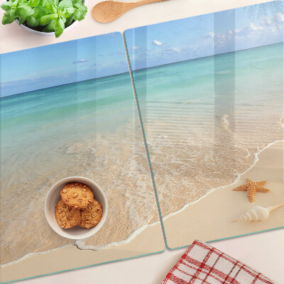 Planche à découper verre Plage avec coquillages et vagues
