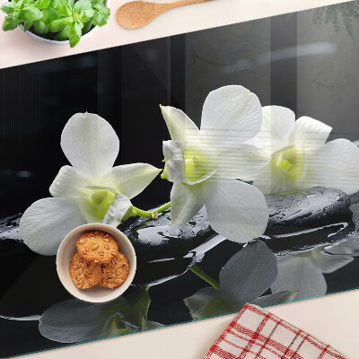 Planche à découper en verre Orchidées sur fond noir