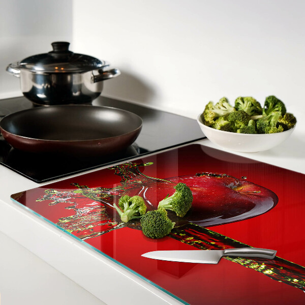 Planche à découper en verre Pomme rouge avec de l'eau