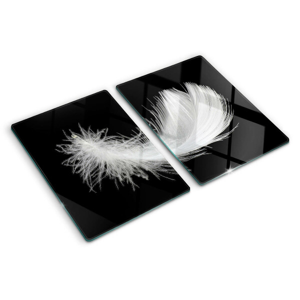Planche à découper en verre Plume sur fond noir