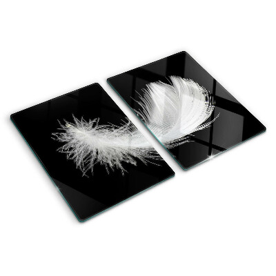 Planche à découper en verre Plume sur fond noir