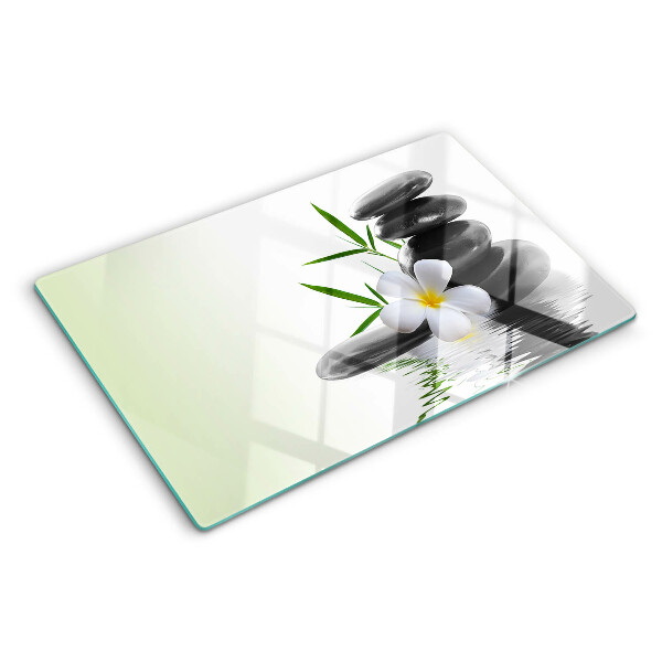Planche à découper verre Fleurs et pierres sur l'eau