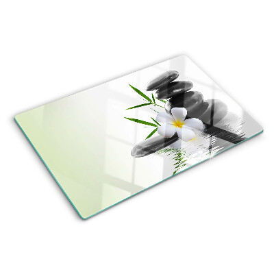 Planche à découper verre Fleurs et pierres sur l'eau