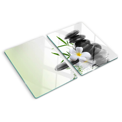 Planche à découper verre Fleurs et pierres sur l'eau