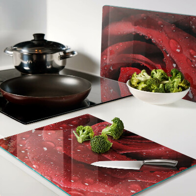 Planche à découper en verre Rose rouge avec des gouttes d'eau