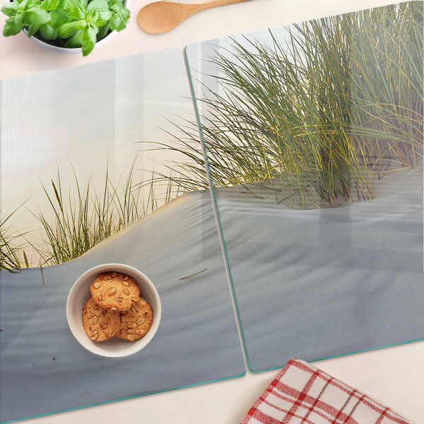 Planche à découper verre L'herbe verte contre le ciel