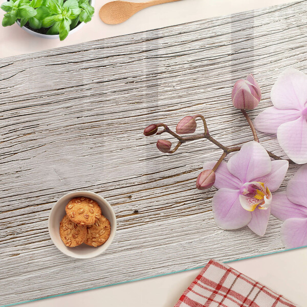 Planche à découper verre Orchidées sur fond de bois