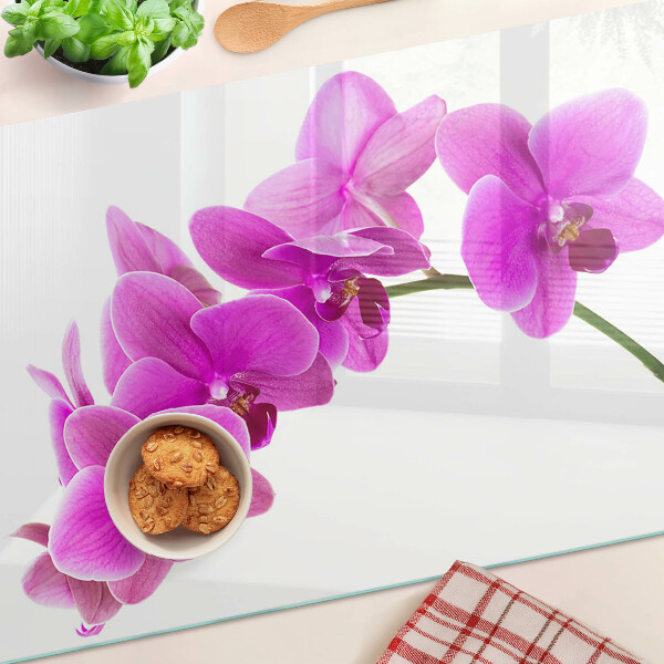 Planche à découper en verre Fleurs d'orchidées dans des tons de rose