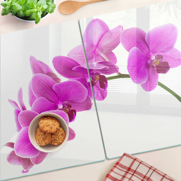 Planche à découper en verre Fleurs d'orchidées dans des tons de rose