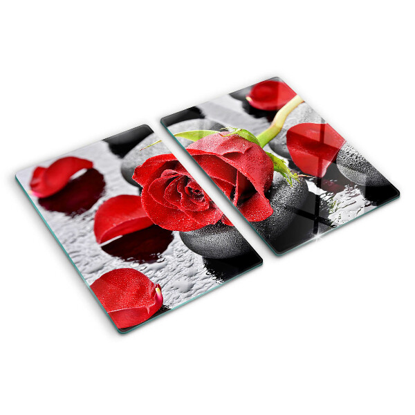 Planche à découper verre Rose sur pierres avec gouttes d'eau