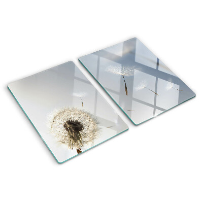 Planche à découper verre Pissenlits en arrière-plan de la fenêtre