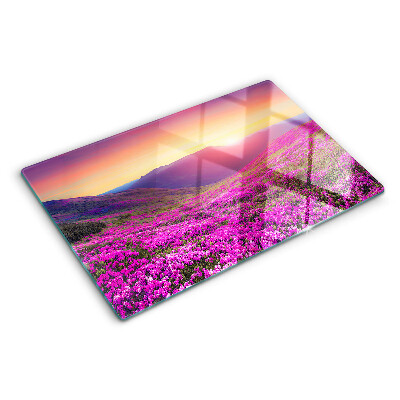 Planche à découper en verre Paysage floral au coucher du soleil