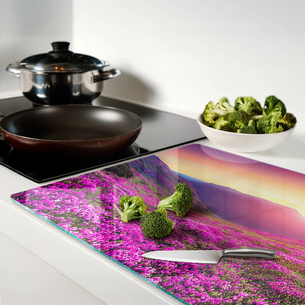 Planche à découper en verre Paysage floral au coucher du soleil