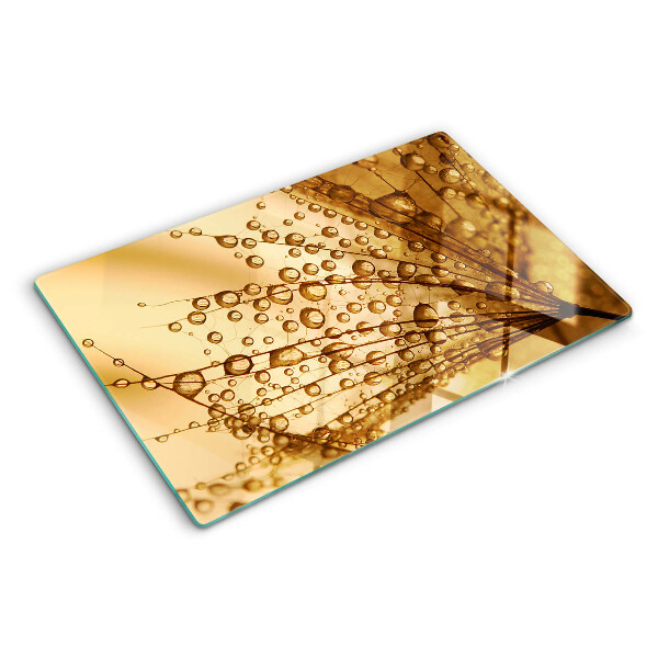 Planche à découper en verre Gouttes d'eau sur une plante