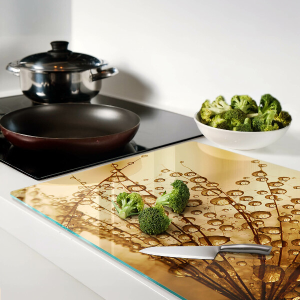 Planche à découper en verre Gouttes d'eau sur une plante