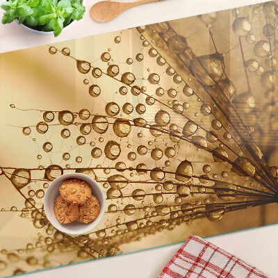 Planche à découper en verre Gouttes d'eau sur une plante