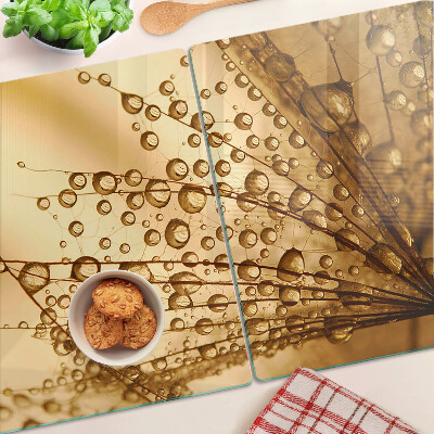 Planche à découper en verre Gouttes d'eau sur une plante