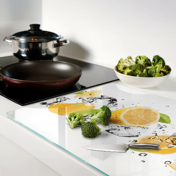 Planche à découper verre Citrons avec de la glace