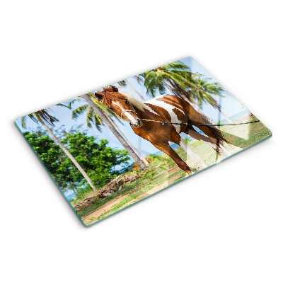 Planche à découper verre Un cheval avec des palmiers en arrière-plan