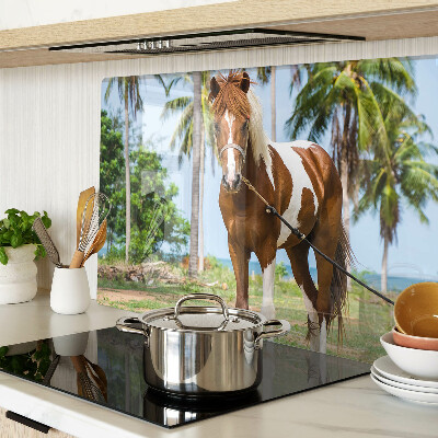 Planche à découper verre Un cheval avec des palmiers en arrière-plan