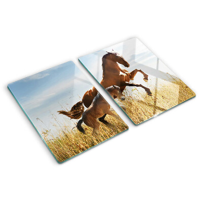 Planche à découper en verre Chevaux dans un pré au soleil
