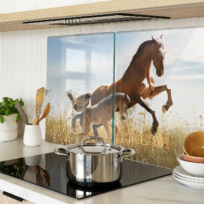 Planche à découper en verre Chevaux dans un pré au soleil