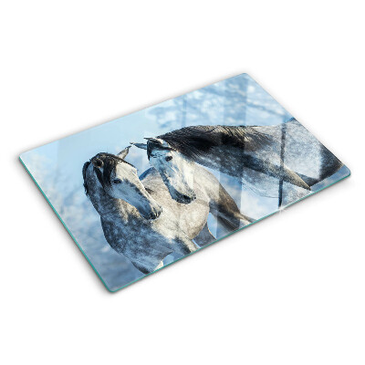 Planche à découper en verre Chevaux dans un paysage hivernal