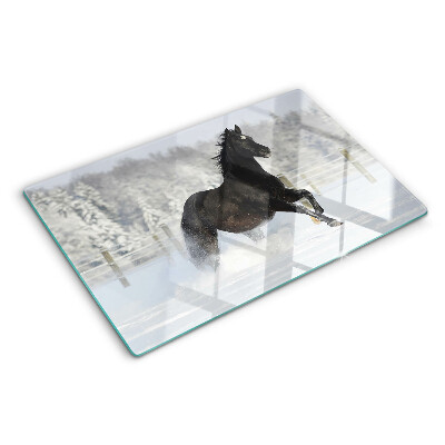 Planche à découper verre Un cheval dans un paysage hivernal