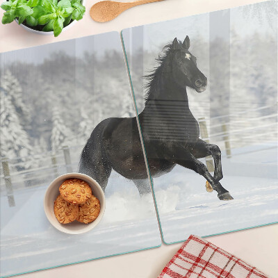 Planche à découper verre Un cheval dans un paysage hivernal
