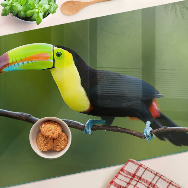 Planche à découper verre Toucan sur une branche