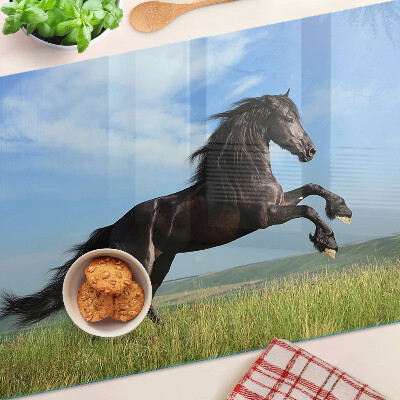 Planche à découper verre Cheval noir dans le pré