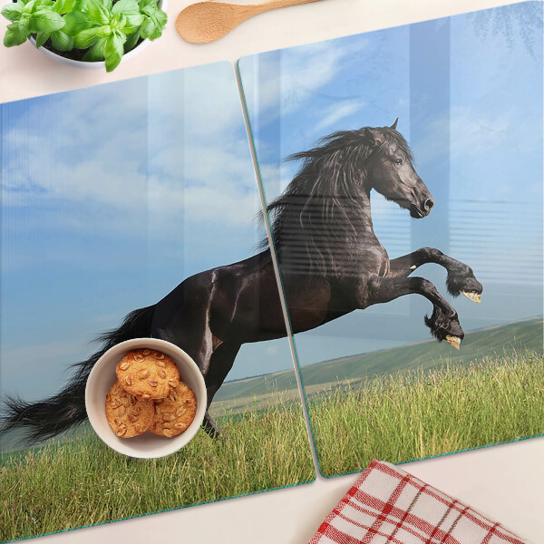 Planche à découper verre Cheval noir dans le pré