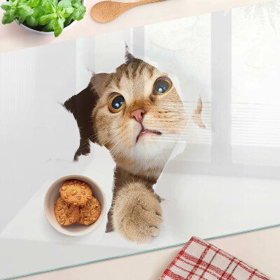 Planche à découper en verre Un chat regardant à travers un trou dans le mur