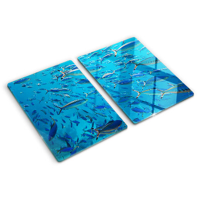 Planche à découper verre Un banc de poissons dans une eau claire