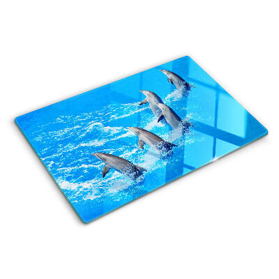 Planche à découper en verre Dauphins sautant par-dessus les vagues