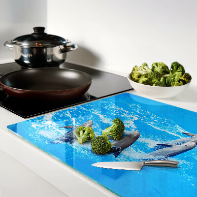 Planche à découper en verre Dauphins sautant par-dessus les vagues