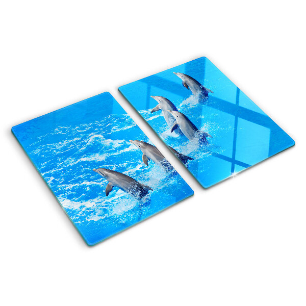 Planche à découper en verre Dauphins sautant par-dessus les vagues