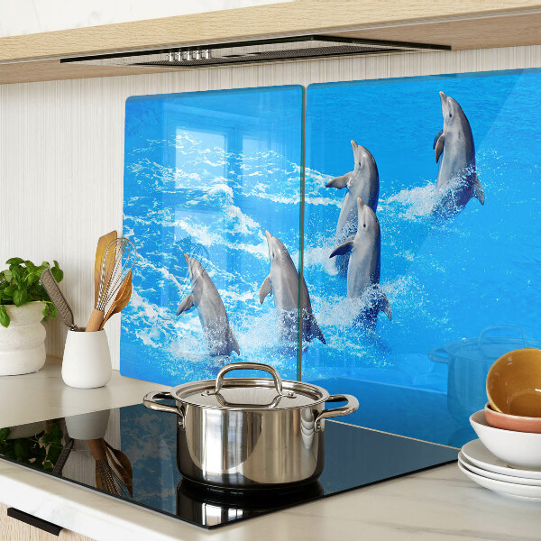 Planche à découper en verre Dauphins sautant par-dessus les vagues