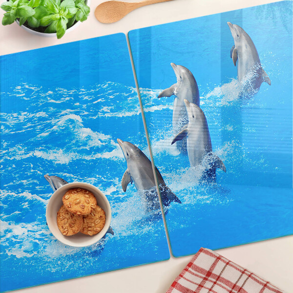 Planche à découper en verre Dauphins sautant par-dessus les vagues