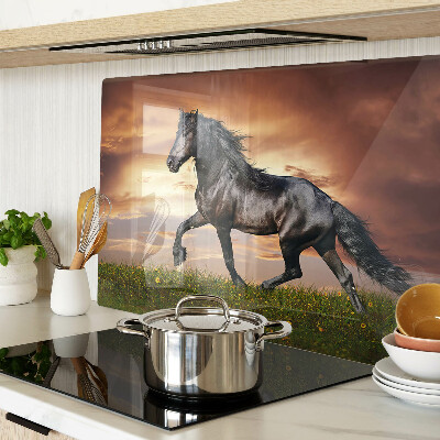 Planche à découper en verre Un cheval sur fond de soleil couchant