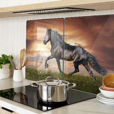 Planche à découper en verre Un cheval sur fond de soleil couchant