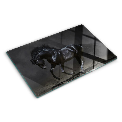Planche à découper en verre Un cheval noir en mouvement