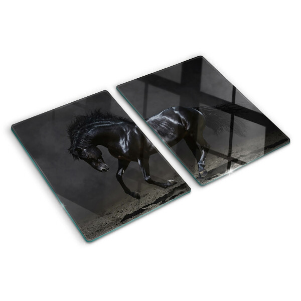 Planche à découper en verre Un cheval noir en mouvement