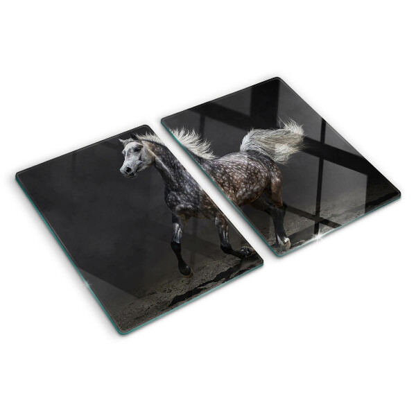 Planche à découper verre Un cheval tacheté en fuite