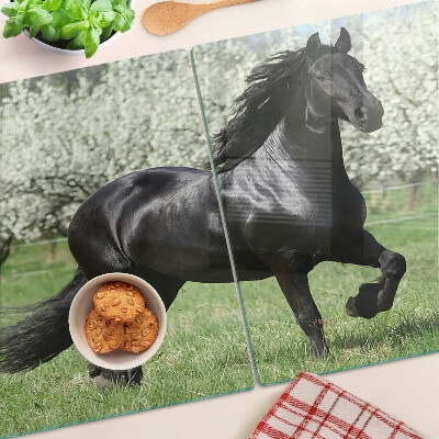 Planche à découper verre Cheval noir dans le pré