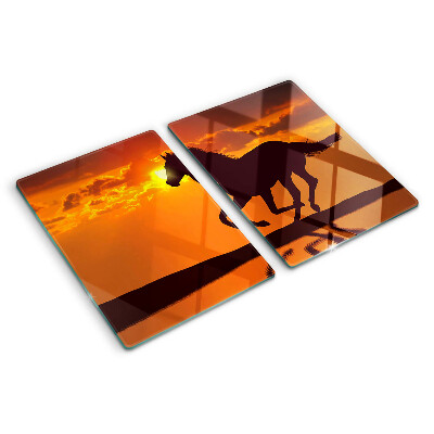 Planche à découper verre Un cheval sur fond de soleil couchant