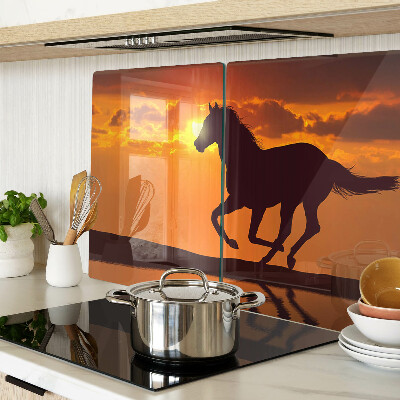 Planche à découper verre Un cheval sur fond de soleil couchant