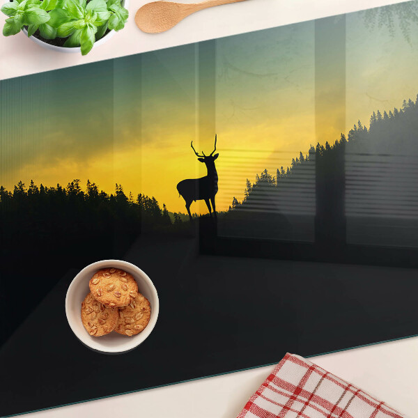 Planche à découper en verre Cerf contre le soleil couchant