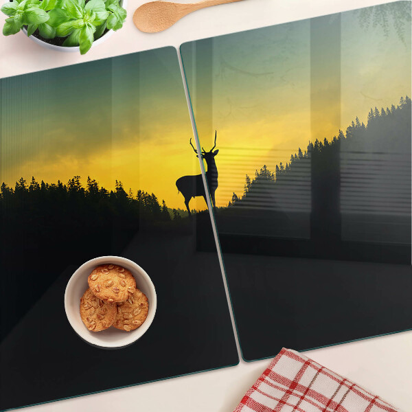 Planche à découper en verre Cerf contre le soleil couchant