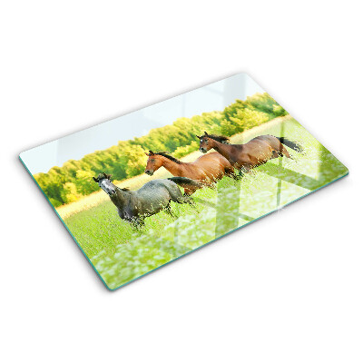 Planche à découper verre Une rencontre de chevaux dans le champ